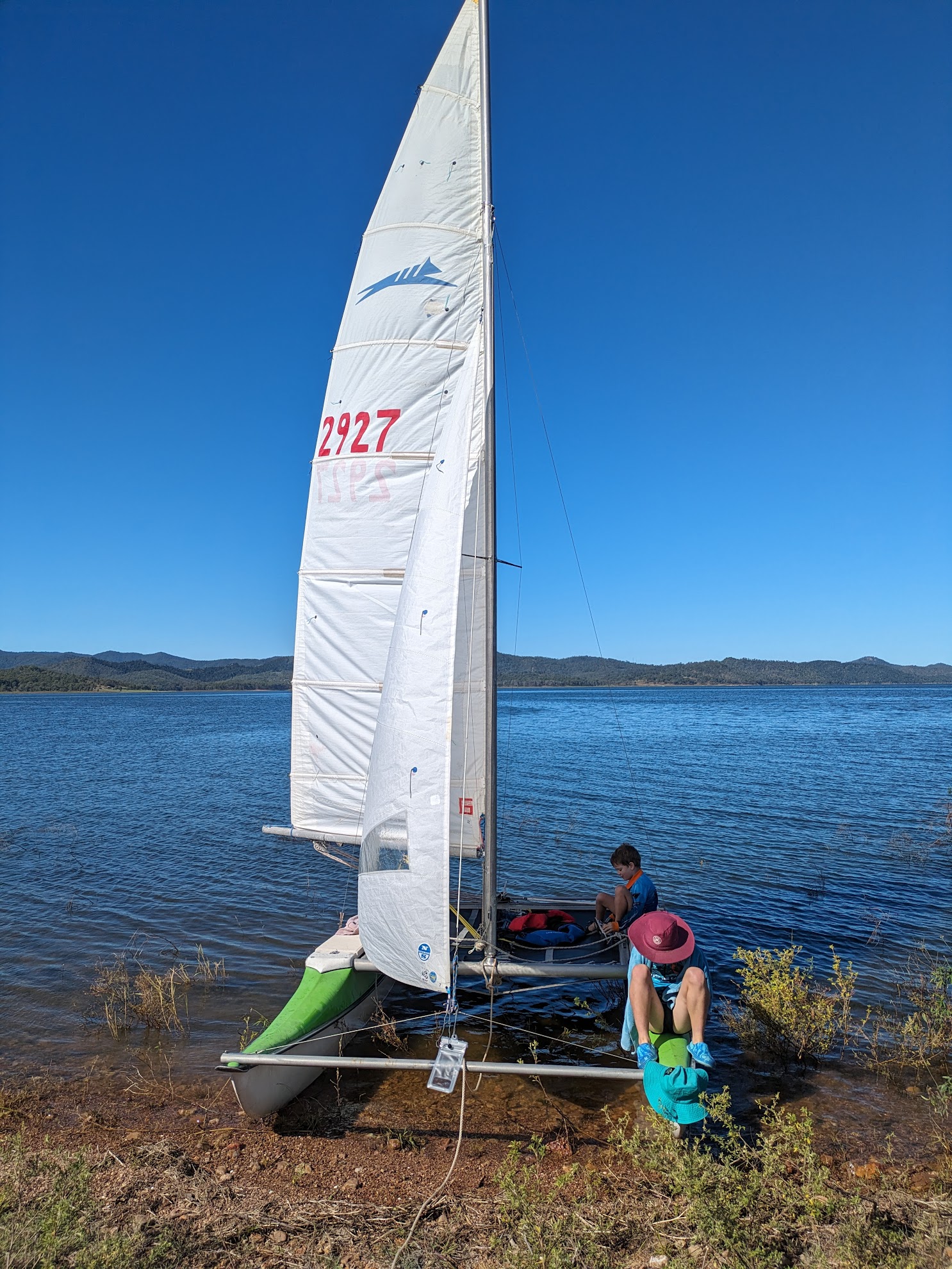A photo of the boat up on a rocky shore. A photo of the boat up on a rocky shore.