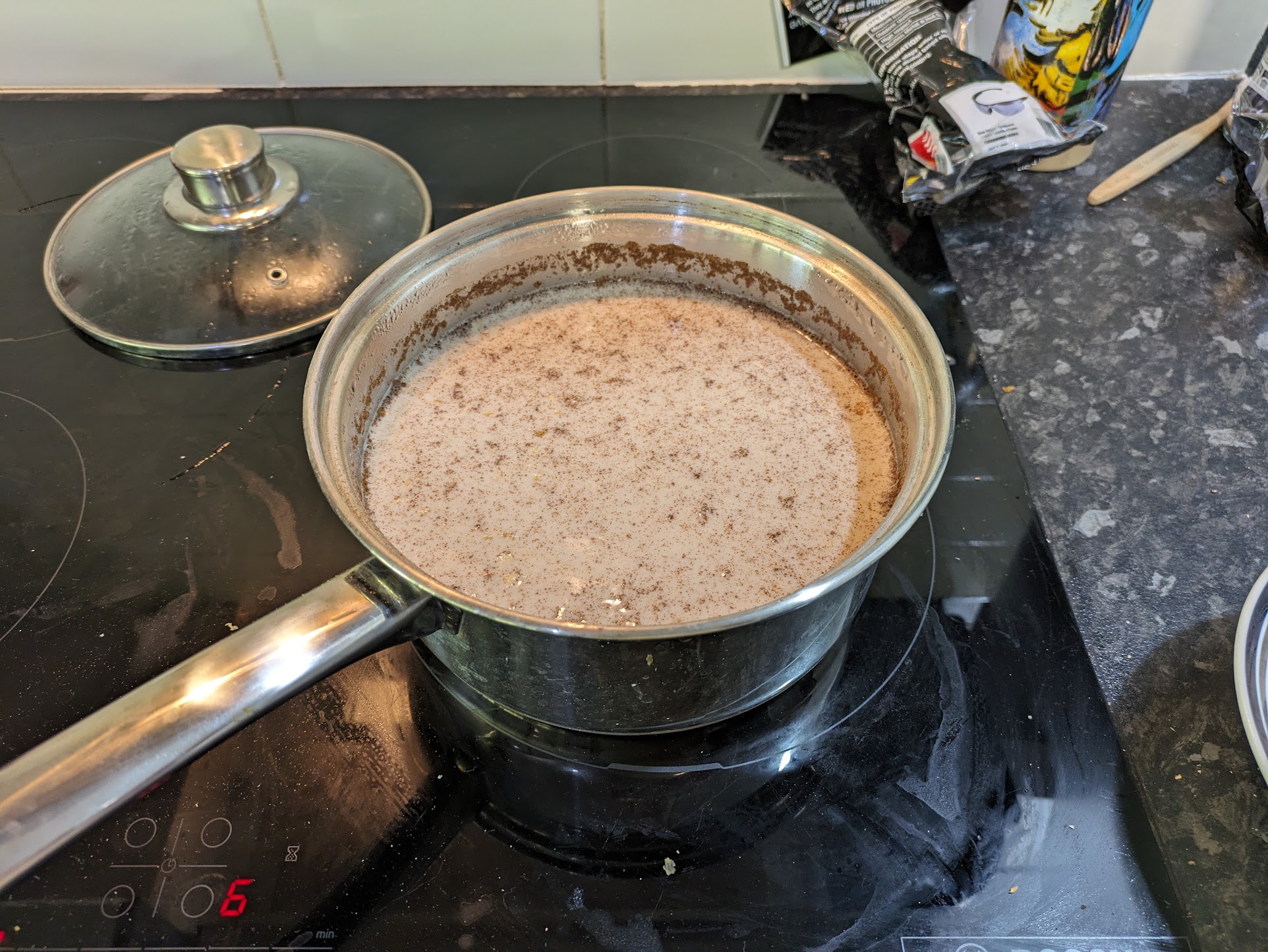 A photo of a pot of porridge on an induction cooktop