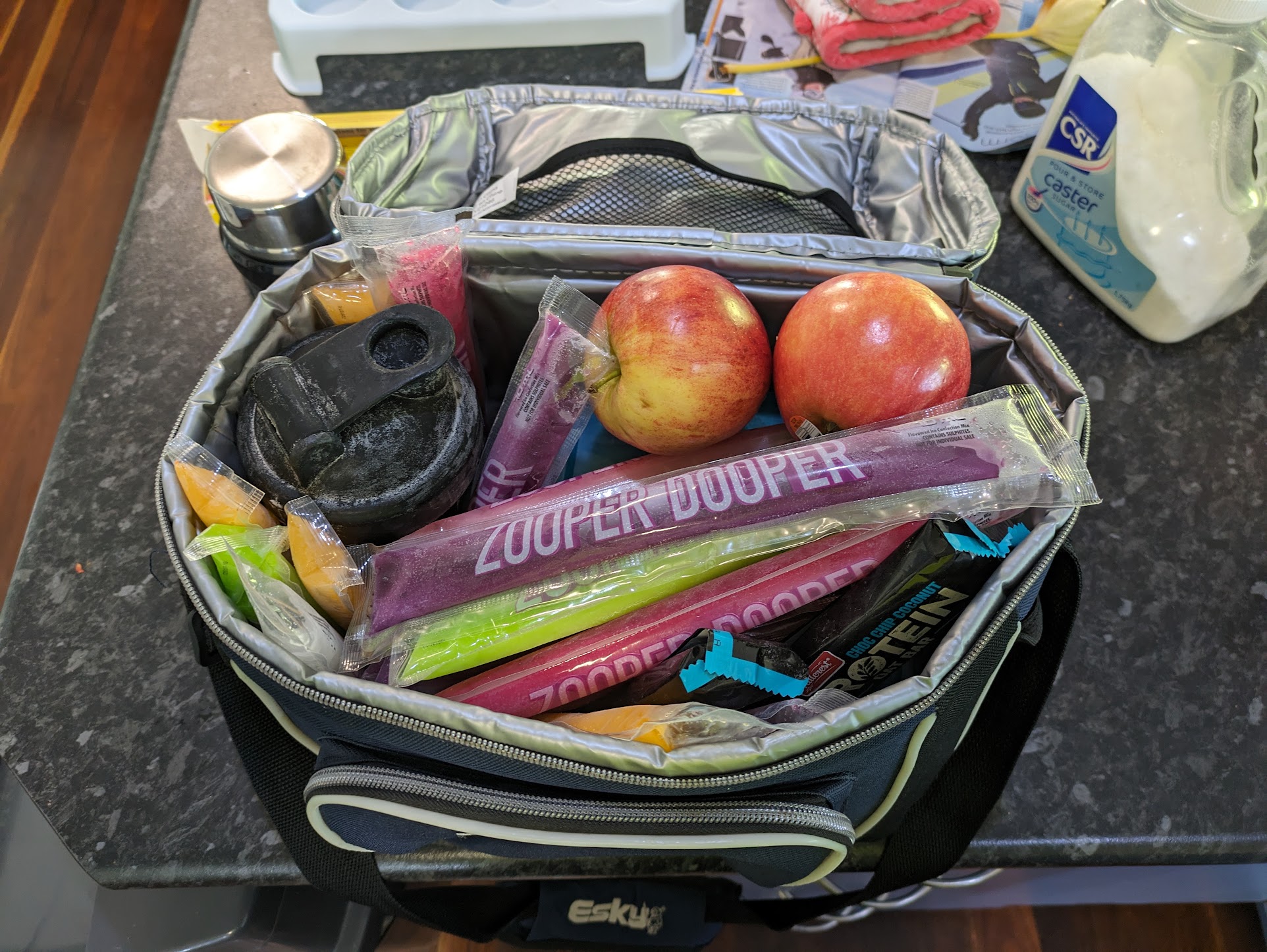 A photo of a freezer bag stuffed with food and zooper doopers